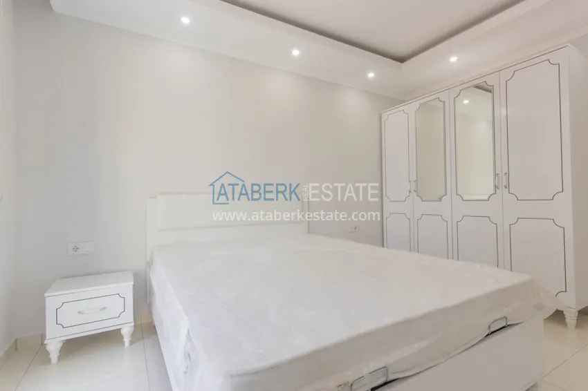 Приобрести Квартира в Махмутларе с мебелью в молодом жилом комплексе 11 