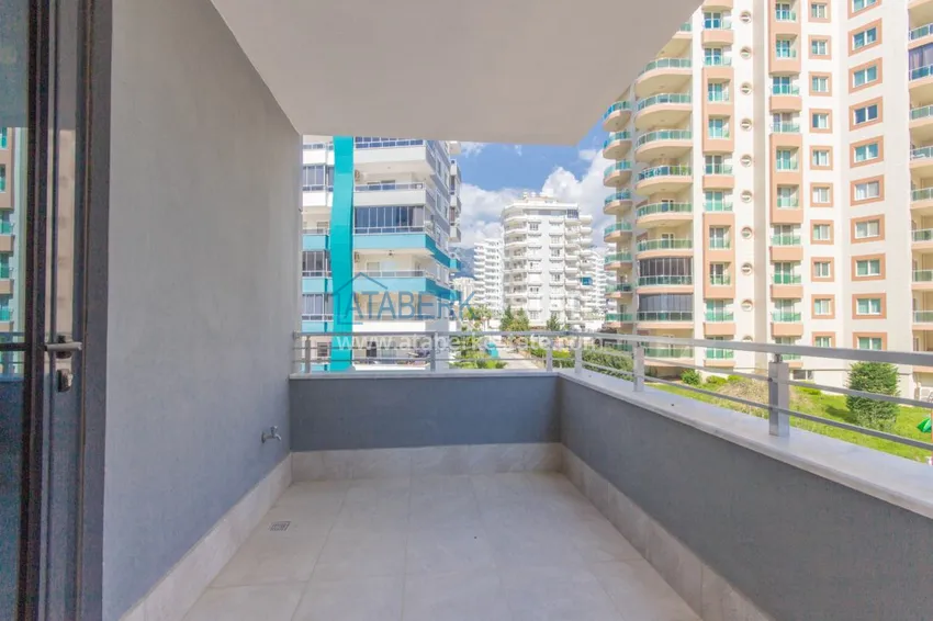 Приобрести Квартира в Махмутларе с мебелью в молодом жилом комплексе 17 