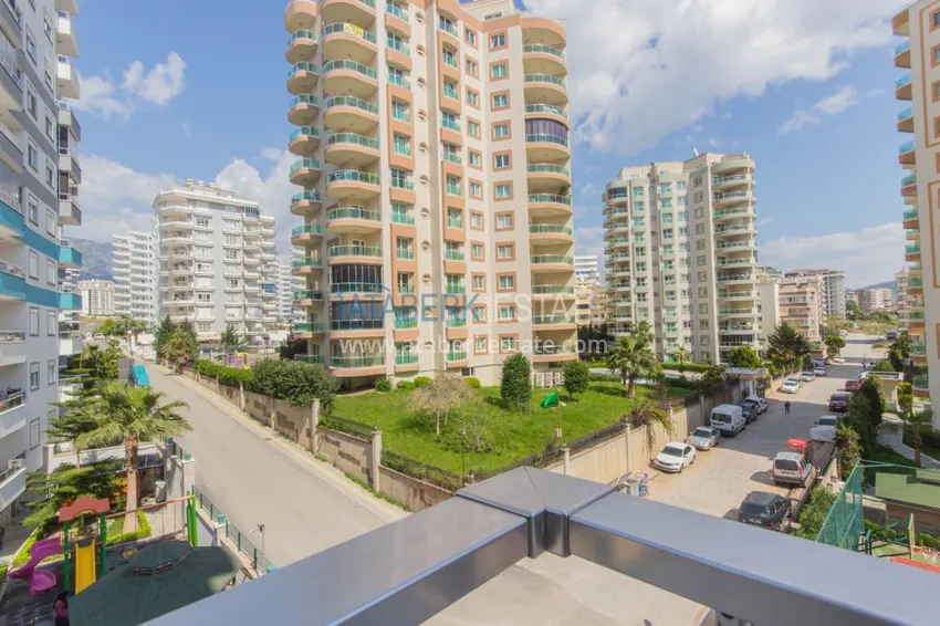 Приобрести Квартира в Махмутларе с мебелью в молодом жилом комплексе 19 