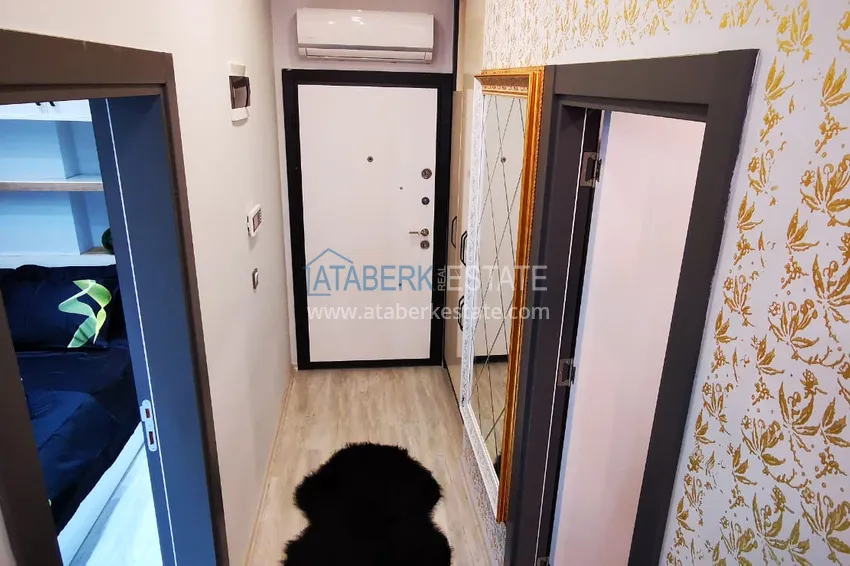 Приобрести Квартира в Махмутларе с новой мебелью в молодом комплексе рядом с морем 1 