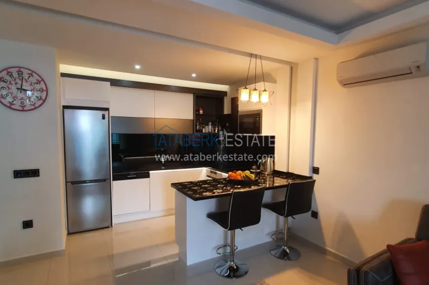 Приобрести Квартира в Каргыджаке с мебелью и застекленным балконом в комплексе на первой береговой линии 13 