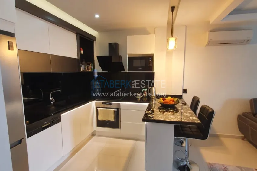 Приобрести Квартира в Каргыджаке с мебелью и застекленным балконом в комплексе на первой береговой линии 4 