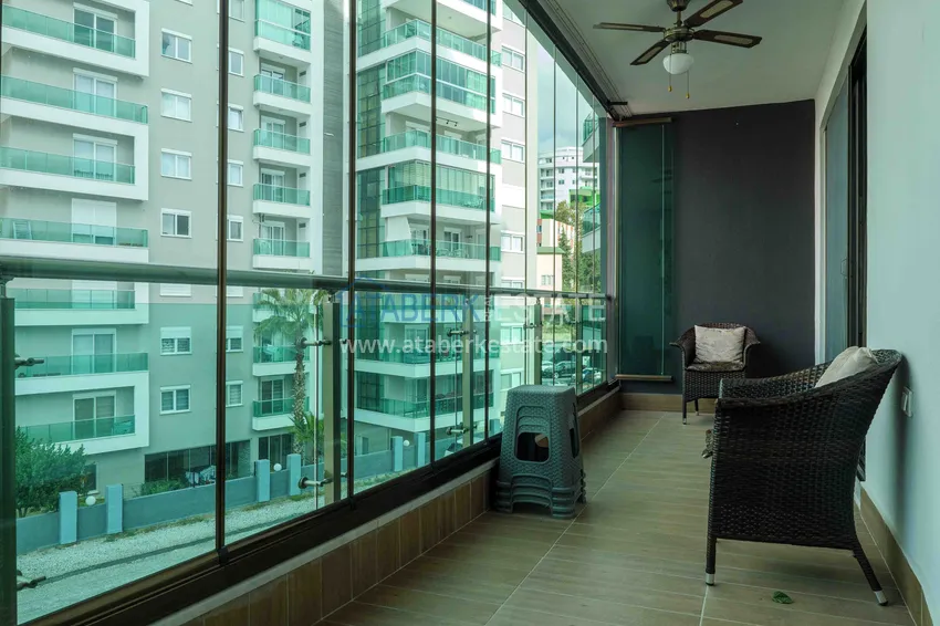 Приобрести Квартира в Махмутларе меблированная в современном комплексе 18 