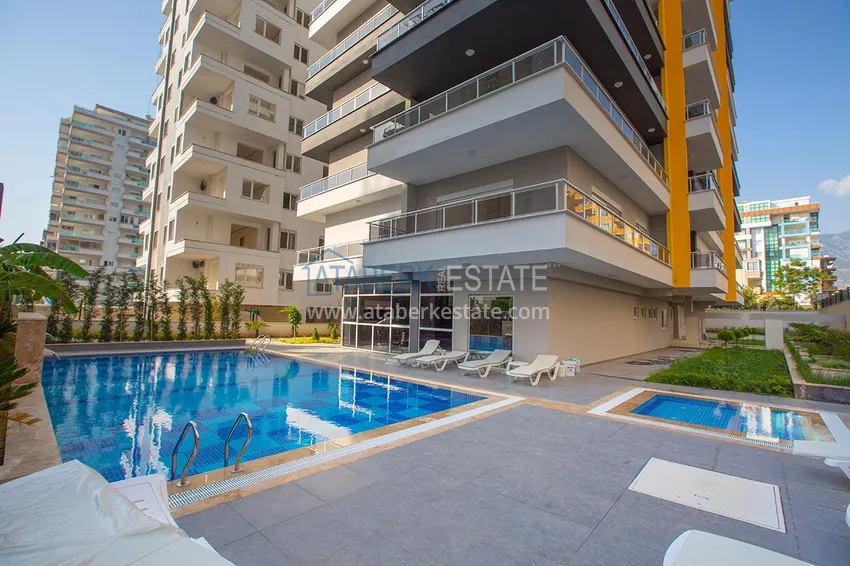 Пентхаус в Махмутларе – изысканный интерьер, отдельная кухня, боковой вид на море  1 