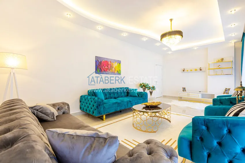 Приобрести Пентхаус в Махмутларе – изысканный интерьер, отдельная кухня, боковой вид на море  3 