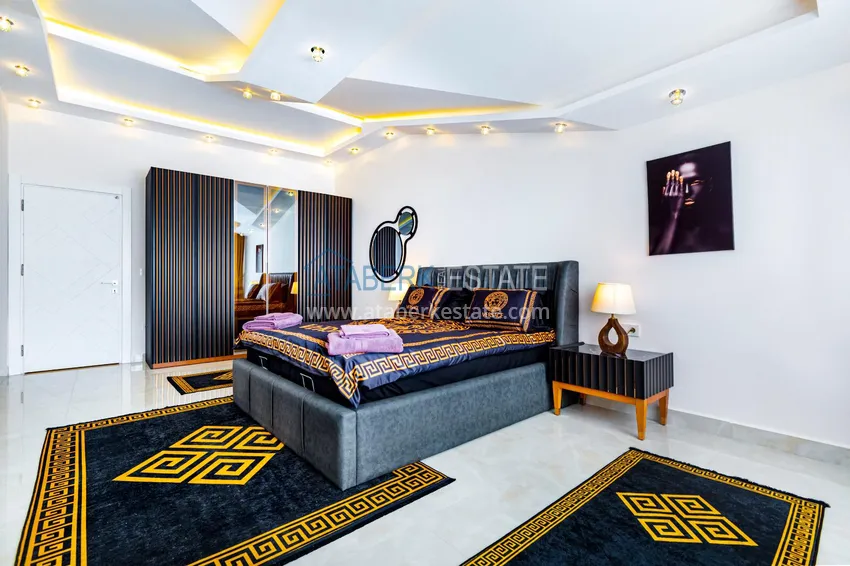 Приобрести Пентхаус в Махмутларе – изысканный интерьер, отдельная кухня, боковой вид на море  8 