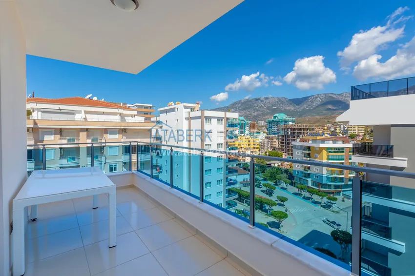 Приобрести Квартира в Махмутларе - современный интерьер частичный вид на море 11 