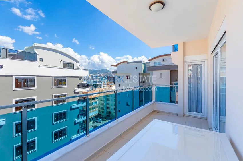 Приобрести Квартира в Махмутларе - современный интерьер частичный вид на море 12 