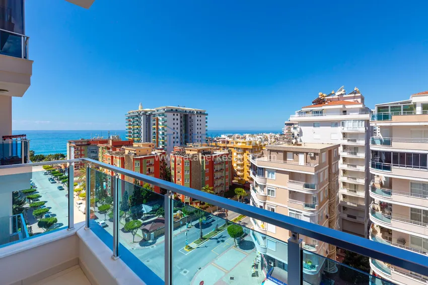 Приобрести Квартира в Махмутларе - современный интерьер частичный вид на море 13 