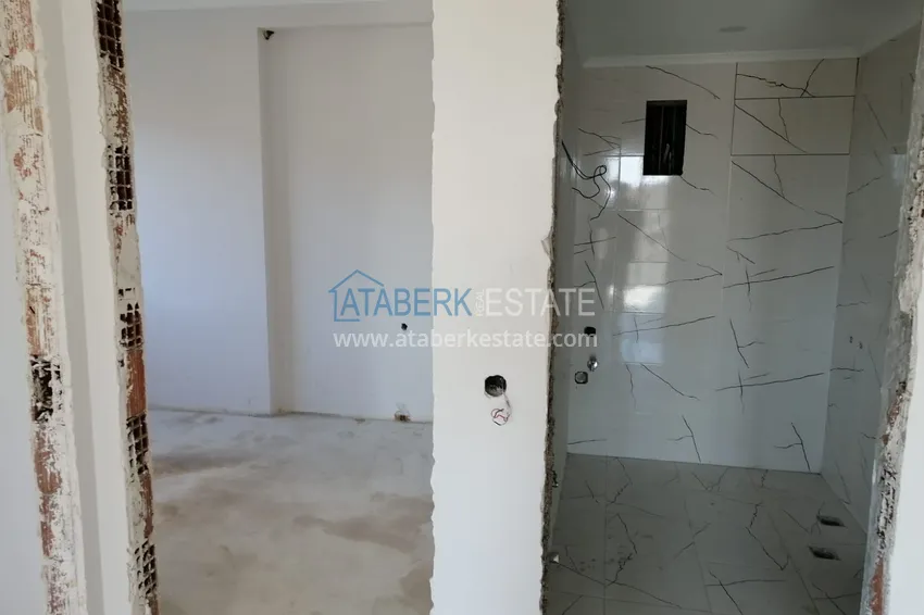 Приобрести Квартира в центре Алании трехкомнатная в строящемся комплексе 14 