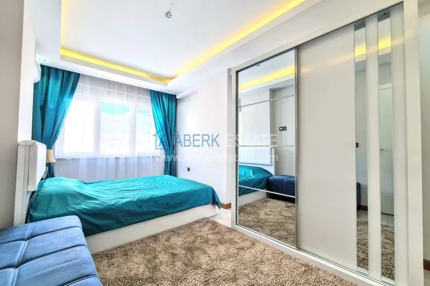 Приобрести Квартира в Махмутларе меблированная трехкомнатная с открытым видом 13 