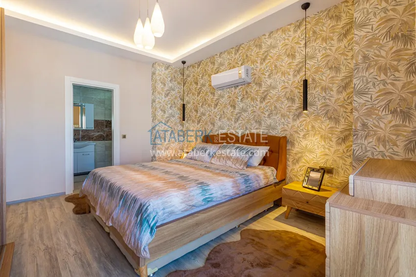 Приобрести Квартира в Махмутларе - современный интерьер частичный вид на море 16 