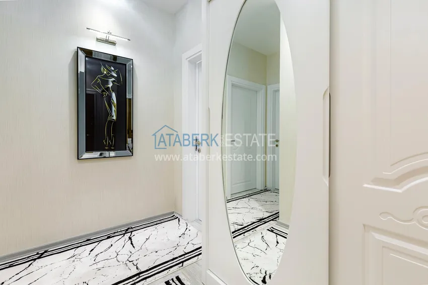 Приобрести Квартира в Махмутларе - современный интерьер частичный вид на море 3 