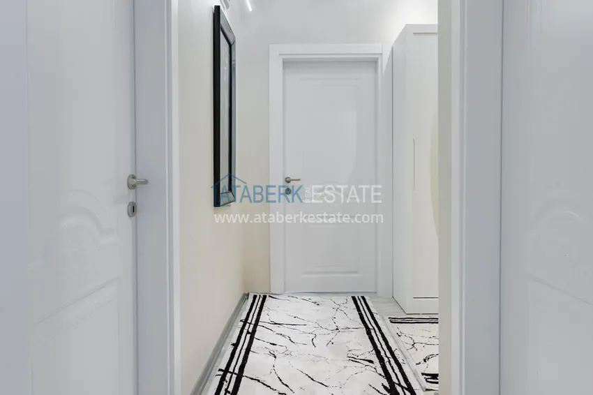 Приобрести Квартира в Махмутларе - современный интерьер частичный вид на море 4 