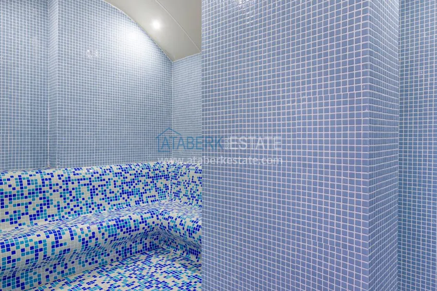 Квартира в Махмутларе - современный интерьер частичный вид на море 6 