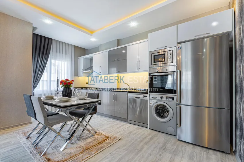 Приобрести Квартира в Махмутларе - современный интерьер частичный вид на море 8 