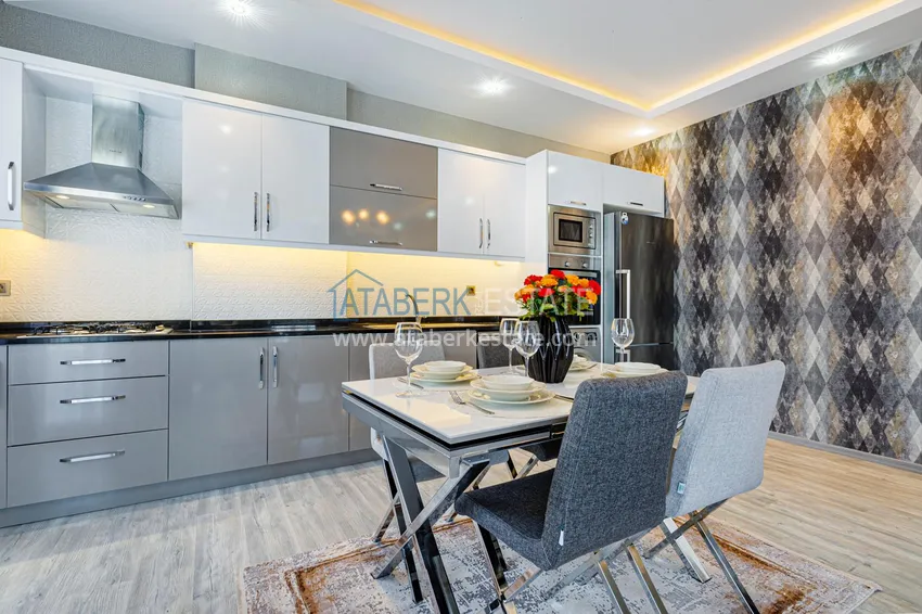 Приобрести Квартира в Махмутларе - современный интерьер частичный вид на море 9 