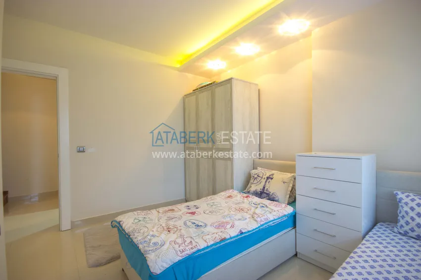 Приобрести Дуплекс в Махмутларе меблированный с видовыми характеристиками  2 