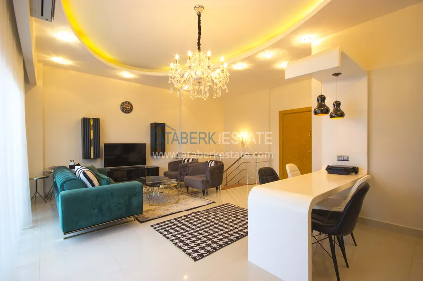 Приобрести Дуплекс в Махмутларе меблированный с видовыми характеристиками  18 