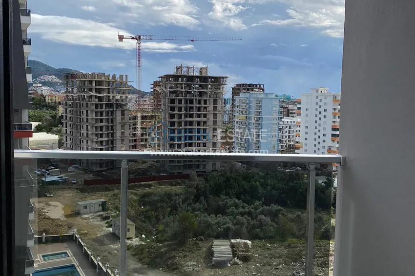 Приобрести Квартира в новом комплексе в Махмутларе с чистовой отделкой 20 