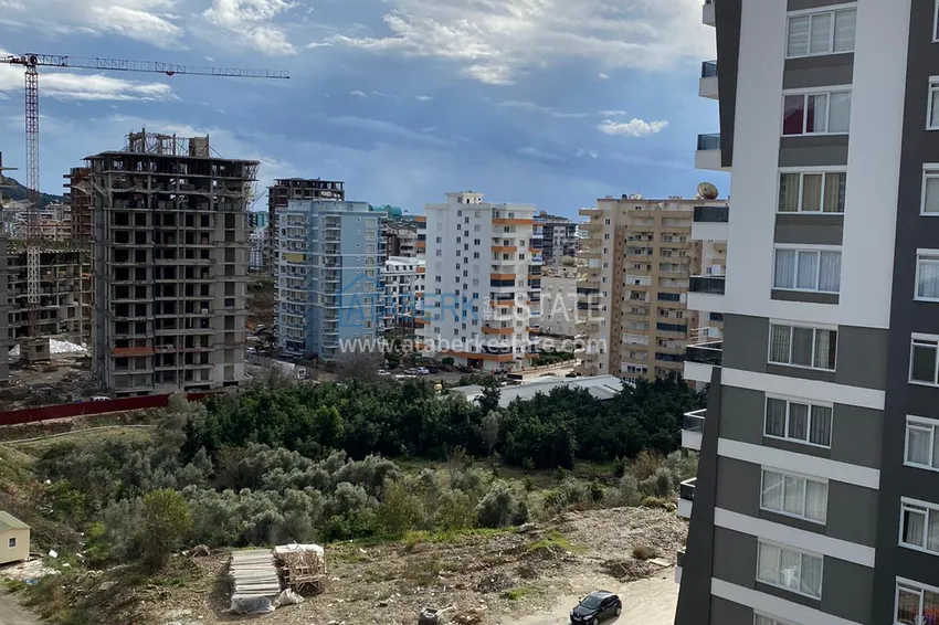 Приобрести Квартира в новом комплексе в Махмутларе с чистовой отделкой 26 