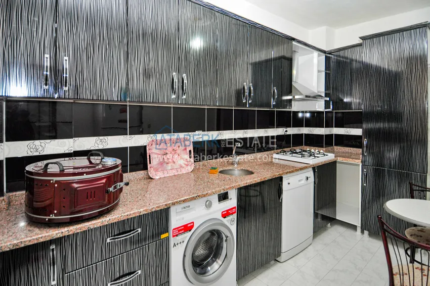 Приобрести Квартира в Махмутларе с мебелью и отдельной кухней в турецком доме  8 