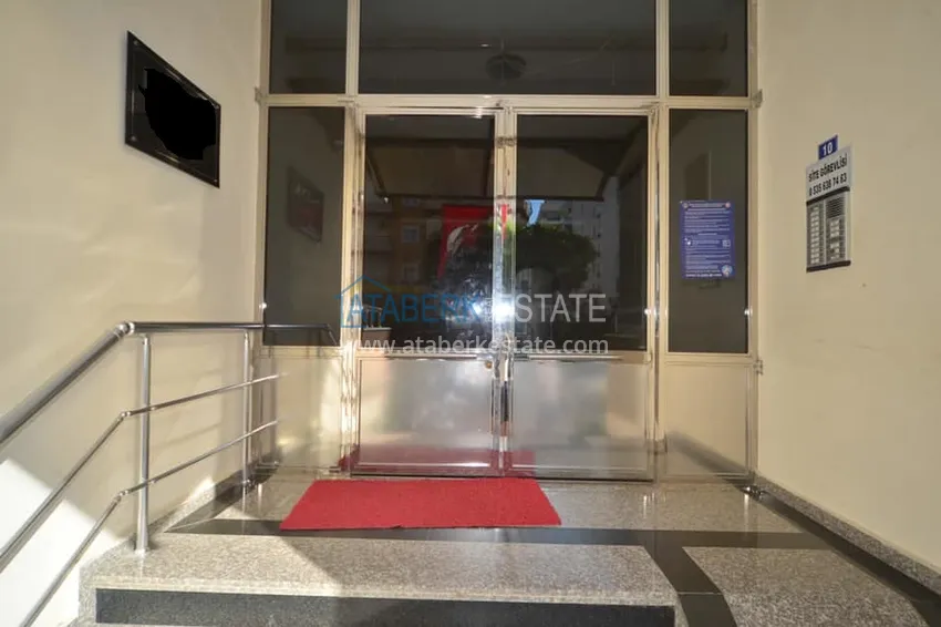 Квартира в Махмутларе с частичным видом на море в комплексе с бассейном 7 