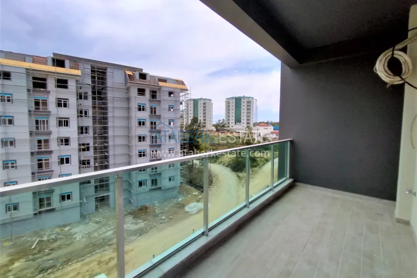 Приобрести Квартира в Авсалларе с чистовой отделкой в новом жилом комплексе 9 