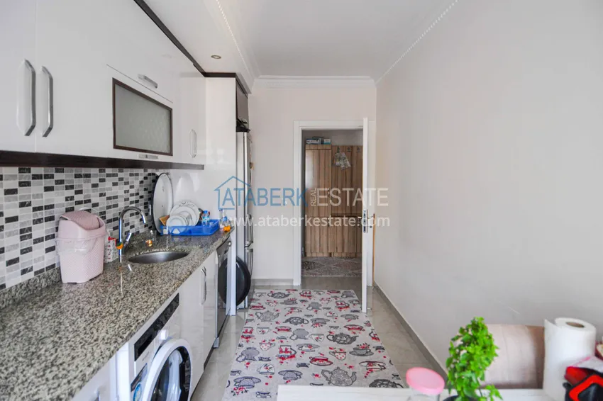 Приобрести Квартира в Махмутларе с отдельной кухней и видом на море  8 