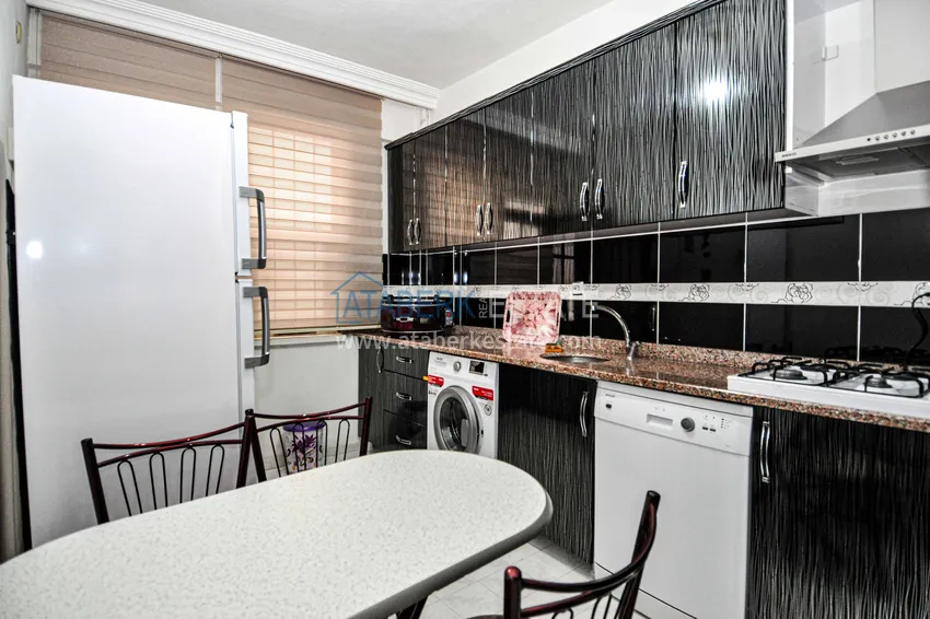 Приобрести Квартира в Махмутларе с мебелью и отдельной кухней в турецком доме  10 