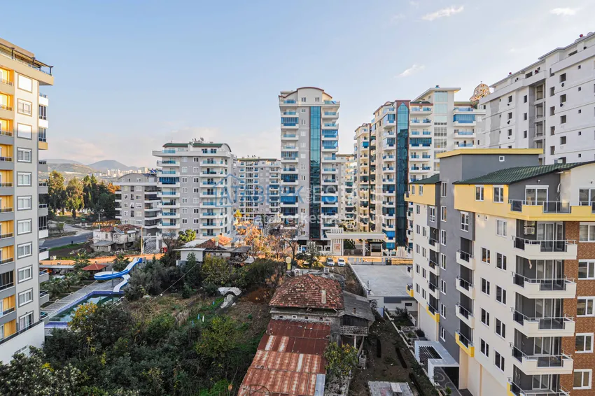 Приобрести Квартира в Махмутларе с отдельной кухней и видом на море  19 