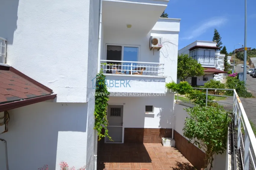 Приобрести Таунхаус в районе Демирташ с мебелью, садом и видом на море  1 