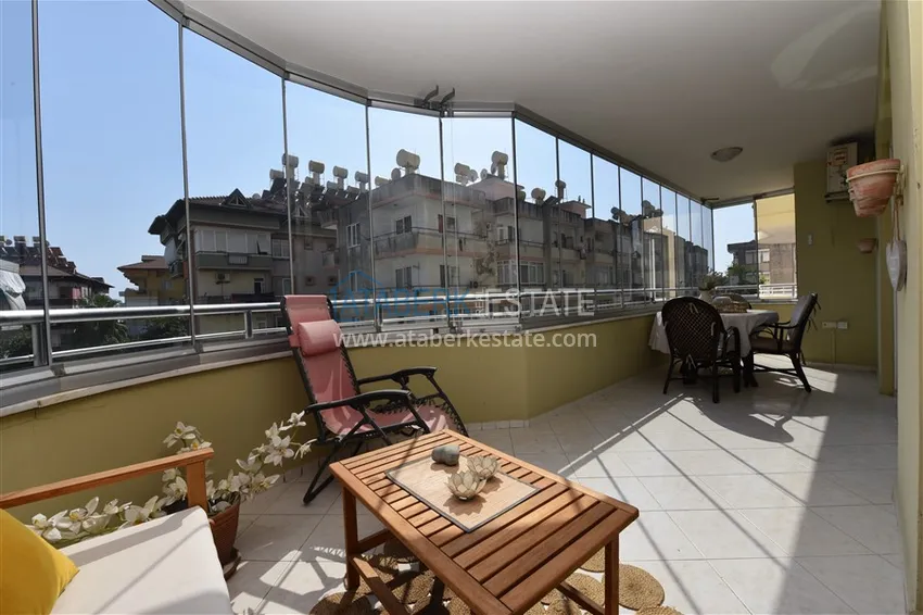 Приобрести Квартира в центре Алании с мебелью, отдельной кухней и застекленными балконами 12 