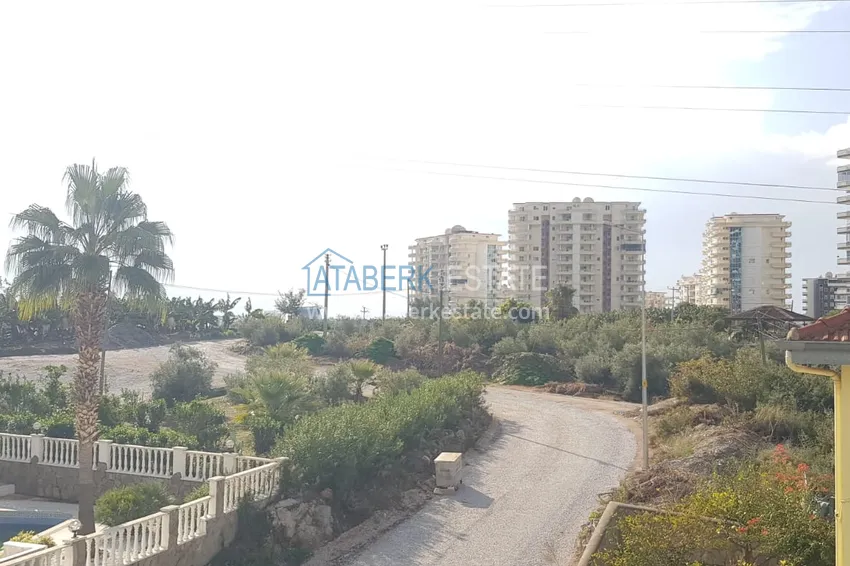 Приобрести Квартира в Махмутларе с чистовой отделкой в благоустроенном комплексе 10 