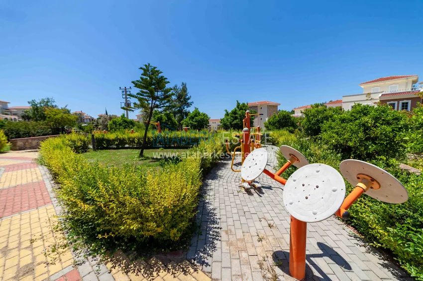 Вилла в Авсалларе трехэтажный таунхаус на два хозяина с частным садиком  10 