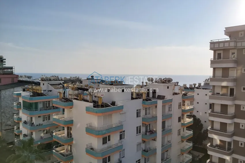 Приобрести Квартира в Махмутларе с мебелью, видом на море и горы, на центральной улице 12 