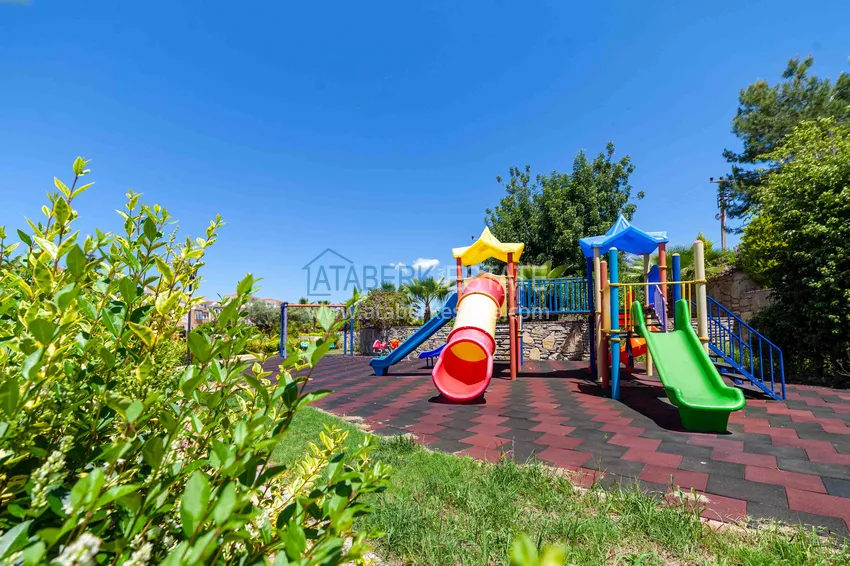 Вилла в Авсалларе трехэтажный таунхаус на два хозяина с частным садиком  11 