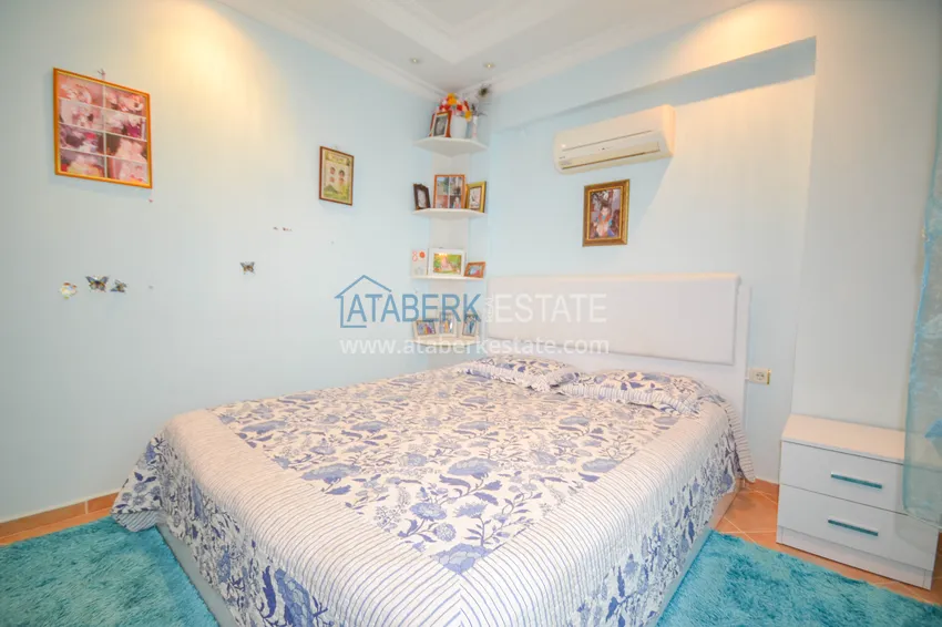 Приобрести Квартира в Махмутларе двухкомнатная с мебелью, в жилом комплексе 11 