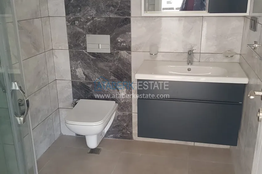 Приобрести Квартира в Махмутларе с чистовой отделкой в благоустроенном комплексе 11 