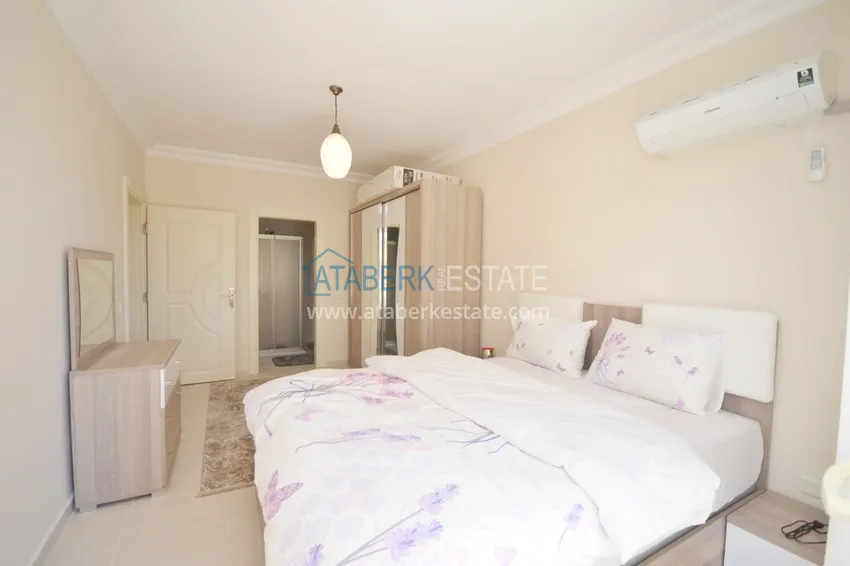 Приобрести Квартира в Махмутларе с двумя спальнями, мебелью, видом на море и горы 12 
