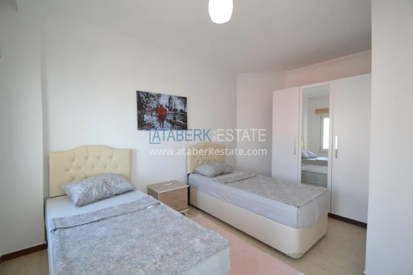 Приобрести Таунхаус в районе Демирташ с мебелью, садом и видом на море  12 