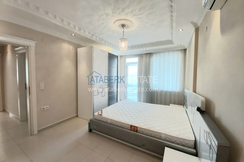 Приобрести Квартира в Махмутларе с мебелью, видом на море и горы, на центральной улице 14 