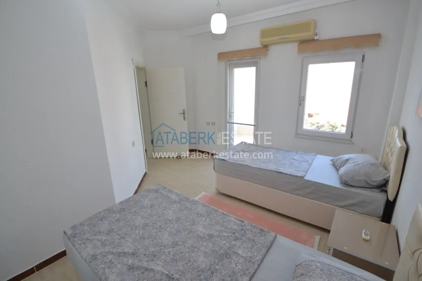 Приобрести Таунхаус в районе Демирташ с мебелью, садом и видом на море  13 