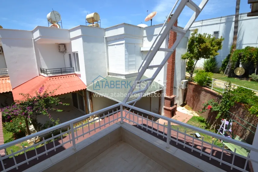 Приобрести Таунхаус в районе Демирташ с мебелью, садом и видом на море  15 