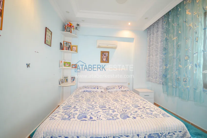 Приобрести Квартира в Махмутларе двухкомнатная с мебелью, в жилом комплексе 12 