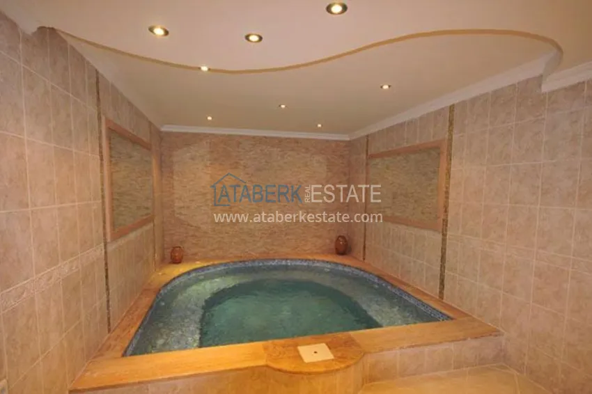 Вилла в Авсалларе трехэтажный таунхаус на два хозяина с частным садиком  12 