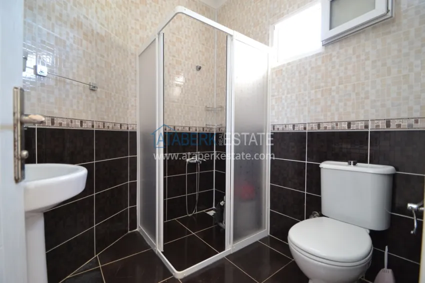 Приобрести Таунхаус в районе Демирташ с мебелью, садом и видом на море  16 