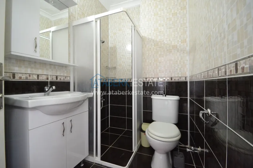 Приобрести Таунхаус в районе Демирташ с мебелью, садом и видом на море  17 