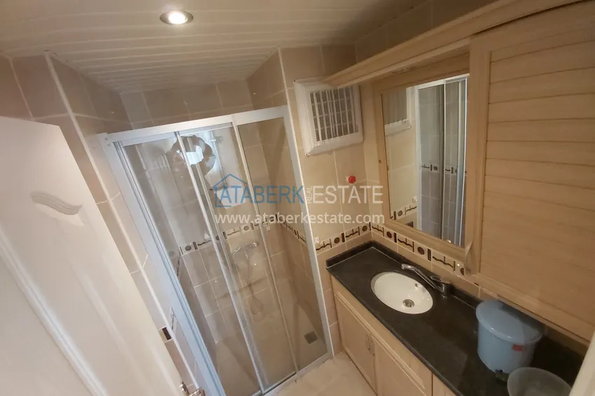 Приобрести Квартира в Махмутларе с мебелью, видом на море и горы, на центральной улице 16 