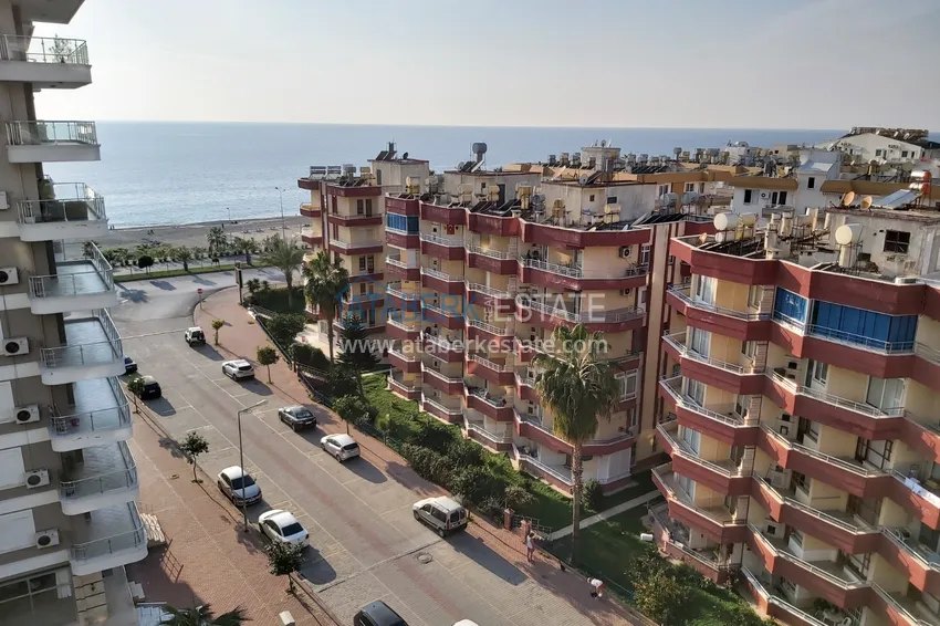 Приобрести Квартира в Махмутларе с мебелью, видом на море и горы, на центральной улице 18 